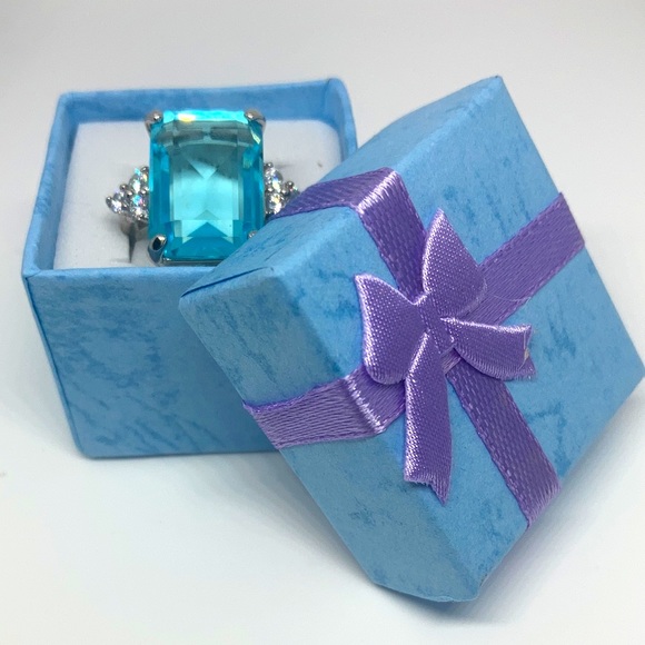 Aquamarine ring with cubic zirconia accents